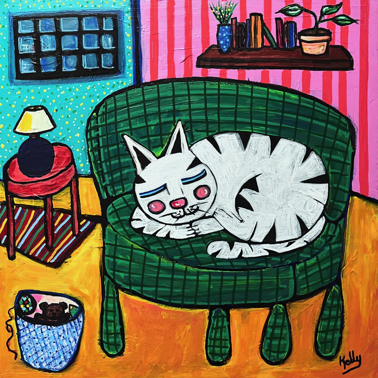 Cat on green chair